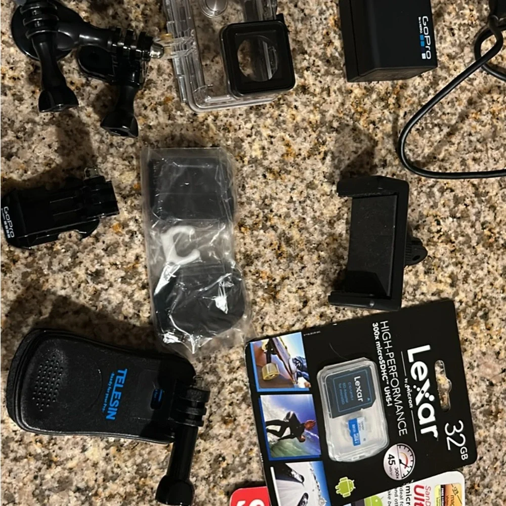 GoPro HERO4 Silver and Accessories Bundle - Black & Silver